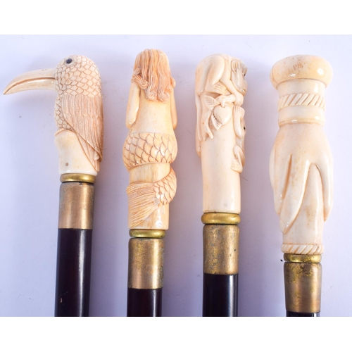 810 - FOUR UNUSUAL CONTINENTAL CARVED BONE WALKING CANES with wooden shafts. 92 cm long.