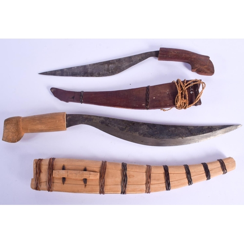 816 - TWO CONTINENTAL WOOD CASED KNIVES. 40 cm long. (2)