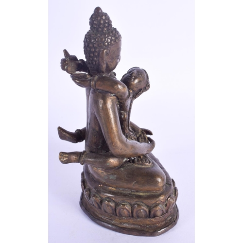 817 - A 19TH CENTURY INDIAN BRONZE FIGURE OF AN EROTIC DEITY. 12 cm x 7 cm.