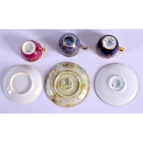 89 - WEDGWOOD LUSTRE MINIATURE CUP AND SAUCER with gilded decoration, a Coalport blue and raised gilt min... 