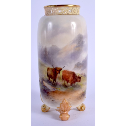 94 - A ROYAL WORCESTER VASE with pierced neck supported on for feet, painted with Highland Cattle by H. S... 