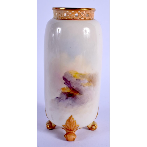 94 - A ROYAL WORCESTER VASE with pierced neck supported on for feet, painted with Highland Cattle by H. S... 