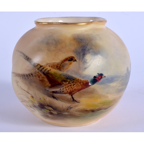 97 - A ROYAL WORCESTER VASE painted with a brace of pheasants by Jas Stinton, signed, shape G161,date cod... 