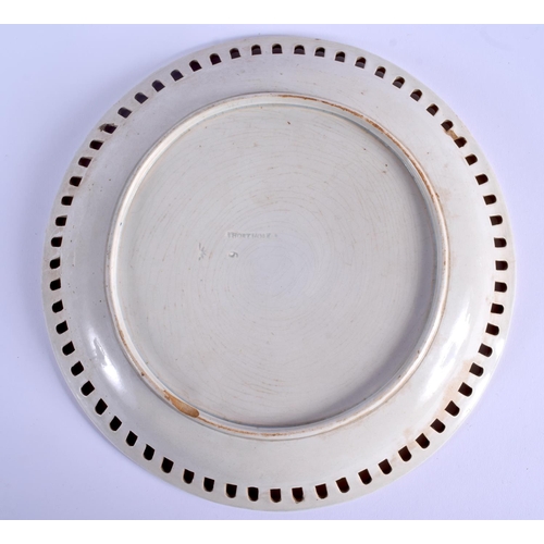 63 - A LATE 18TH CENTURY CREAMWARE SHORTHOUSE POTTERY LATTICE DISH. 23.5 cm diameter.