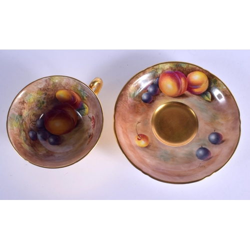 110 - Royal Worcester teacup and saucer painted with fruit by John Cook, signed, date 1978 or later.  Cup ... 