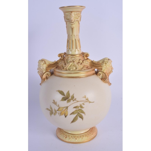 112 - Royal Worcester vase with two mask and foliate moulded handles and  a narrow flower moulded neck abo... 