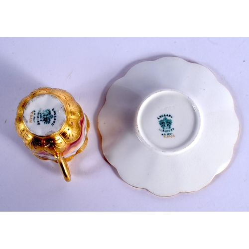 116 - Late 19th c. Coalport lobed demi tasse coffee cup and saucer with sponge decoration and a gilt tan b... 