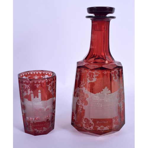 12 - A 19TH CENTURY BOHEMIAN RUBY GLASS DECANTER AND STOPPER together with a similar beaker. 24 cm high. ... 