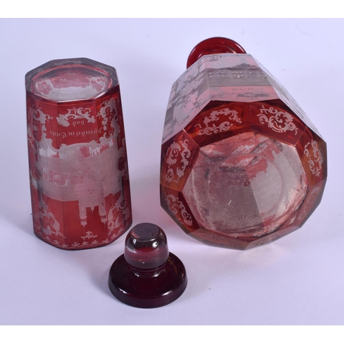 12 - A 19TH CENTURY BOHEMIAN RUBY GLASS DECANTER AND STOPPER together with a similar beaker. 24 cm high. ... 