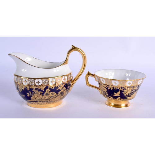 139 - Royal Crown Derby Old Aves pattern cream jug and cup and saucer.  Jug 11.5cm high (3)