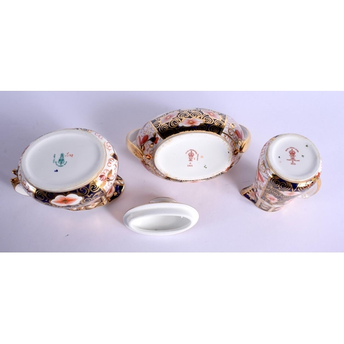 141 - Royal Crown Derby imari pattern 2451 boat shaped sugar bowl and cover, a milk jug and cream jug.  Bo... 