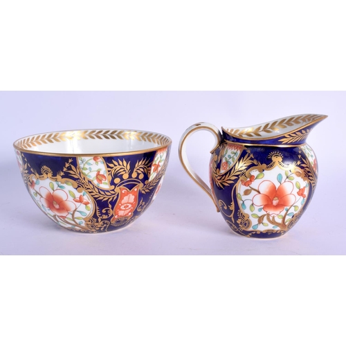 143 - Royal Crown Derby pattern 1952 cream jug and basin.  Jug 9.5cm high (2)