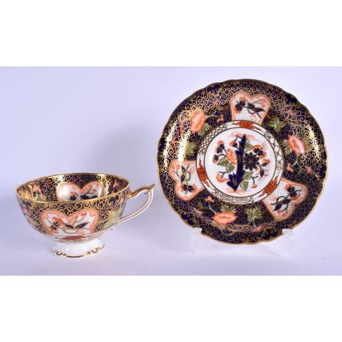 144 - Royal Crown Derby imari pattern 9022 cup and saucer.  Cup 5.5cm high, Saucer 14cm wide