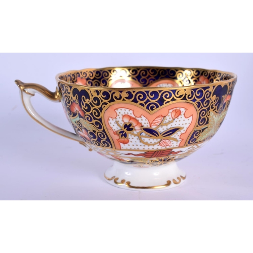 144 - Royal Crown Derby imari pattern 9022 cup and saucer.  Cup 5.5cm high, Saucer 14cm wide