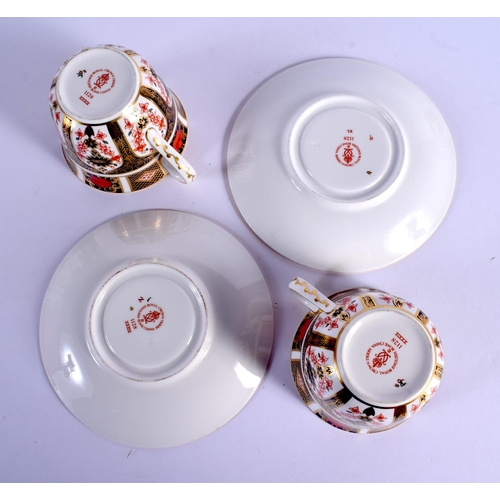 147 - Royal Crown Derby imari pattern 1128 two cups and saucers.  Cup 7cm high, Saucer 14.5cm wide (4)