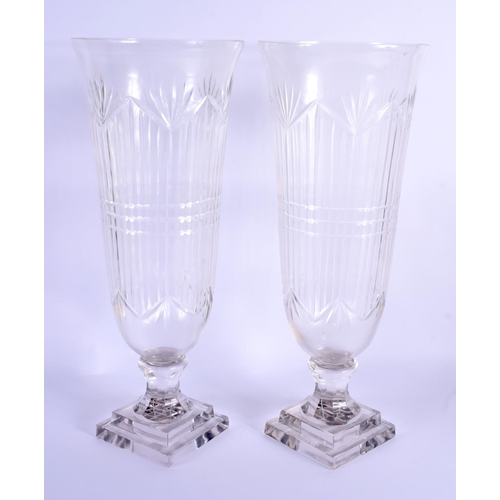 15 - A PAIR OF CUT GLASS STORM CELERY LAMPS. 42 cm high.