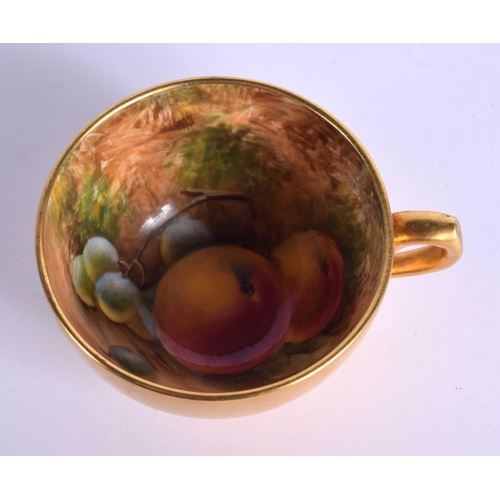 161 - Royal Worcester demi tasse teacup and saucer painted with fruit by J. Smith, signed, date code 1956.... 