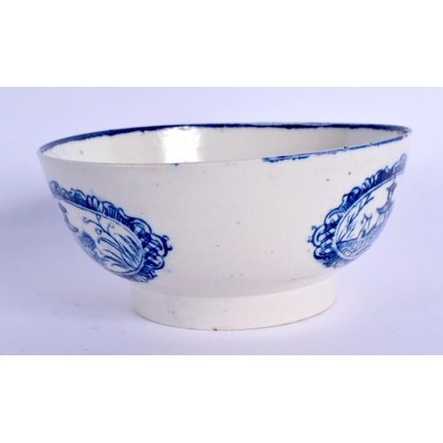 167 - 18th c. Liverpool bowl decorated in blue with an oriental figure holding a bird  by a fence in a ova... 