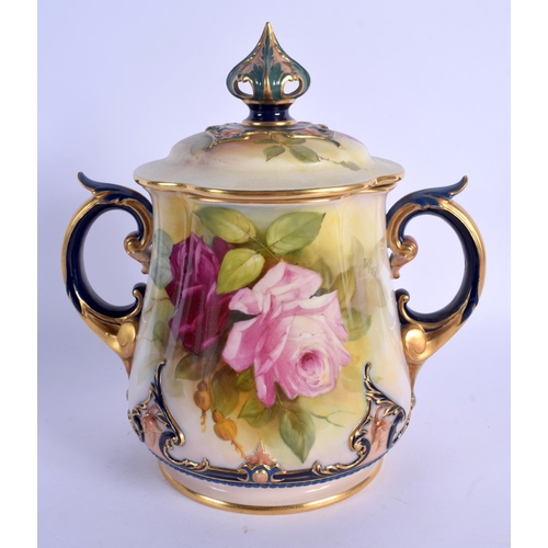 198 - Royal Worcester Hadleys style two handled vase and cover painted with roses by W.H. Austin date cod... 