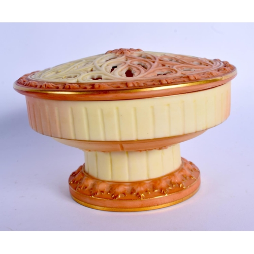 211 - Locke Worcester circular pot pourri the moulded ground in ivory and blush ivory c.1900.  8cm high, 1... 