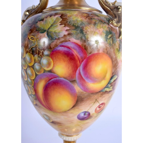 250 - A FINE PAIR OF ROYAL WORCESTER TWIN HANDLED PORCELAIN VASES by Freeman, wonderfully painted with pea... 