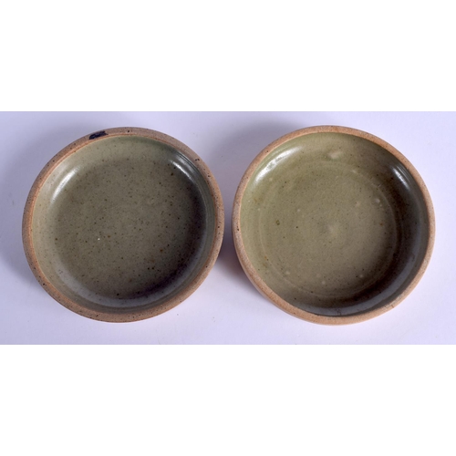 254 - A PAIR OF ST IVES STUDIO POTTERY DISHES. 10.5 cm wide.