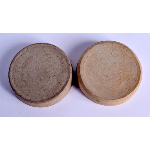 254 - A PAIR OF ST IVES STUDIO POTTERY DISHES. 10.5 cm wide.