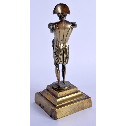 267 - A 19TH CENTURY FRENCH BRONZE FIGURE OF NAPOLEON BONAPARTE modelled with arms crossed. 18 cm high.