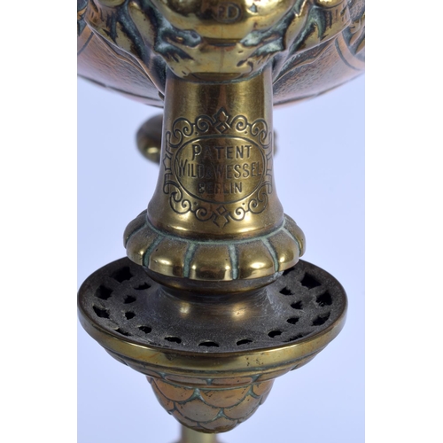 271 - A RARE 19TH CENTURY BRONZE GENIE TYPE OIL LAMP by Wild and Wessel of Berlin, overlaid with foliage a... 