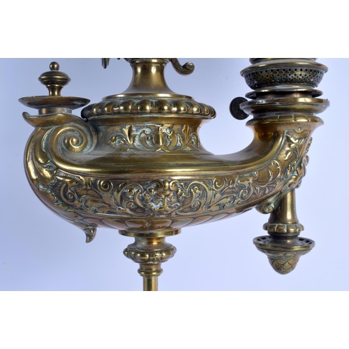 271 - A RARE 19TH CENTURY BRONZE GENIE TYPE OIL LAMP by Wild and Wessel of Berlin, overlaid with foliage a... 