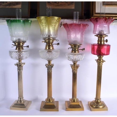 272 - A VERY RARE COMPOSITE SET OF FOUR 19TH CENTURY CORINTHIAN COLUMN CANDLESTICKS converted to oil lamps... 