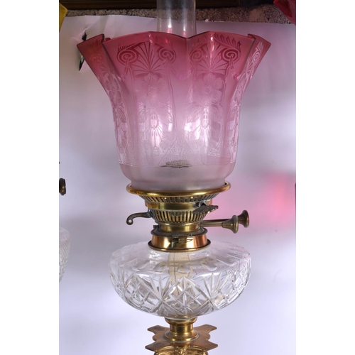 272 - A VERY RARE COMPOSITE SET OF FOUR 19TH CENTURY CORINTHIAN COLUMN CANDLESTICKS converted to oil lamps... 