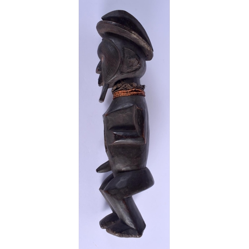 275 - AN AFRICAN TRIBAL CARVED WOOD FIGURE OF A BEADED MALE with vacant stomach. 42 cm high.