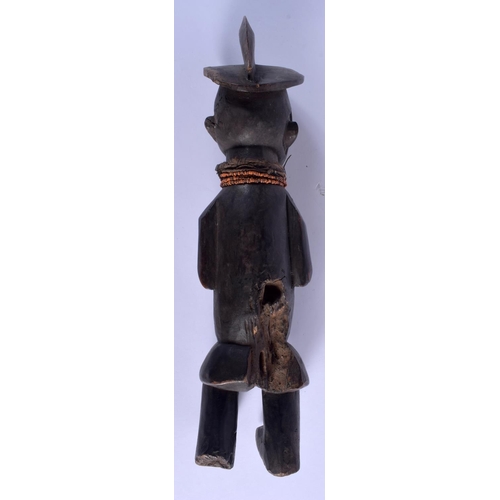 275 - AN AFRICAN TRIBAL CARVED WOOD FIGURE OF A BEADED MALE with vacant stomach. 42 cm high.