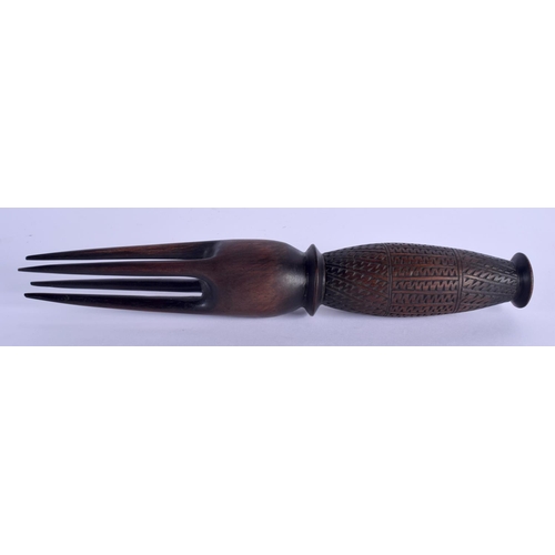 283 - A POLYNESIAN TRIBAL HARDWOOD PRONGED FORK. 30 cm long.