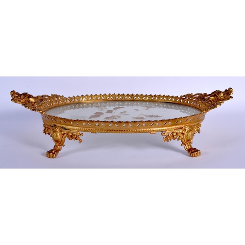 314 - A LARGE 19TH CENTURY FRENCH ORMOLU AND CLEAR GLASS TRAY decorated with gilt foliage. 48 cm x 30 cm.