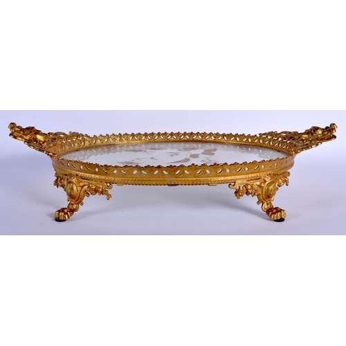 314 - A LARGE 19TH CENTURY FRENCH ORMOLU AND CLEAR GLASS TRAY decorated with gilt foliage. 48 cm x 30 cm.