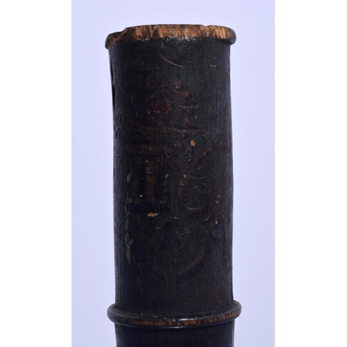 317 - AN UNUSUAL 19TH CENTURY PAINTED MILITARY CARVED WOOD TIP STAFF painted with a cypher. 37 cm long.