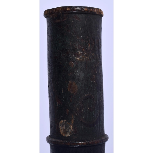 317 - AN UNUSUAL 19TH CENTURY PAINTED MILITARY CARVED WOOD TIP STAFF painted with a cypher. 37 cm long.