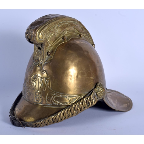 321 - A 1940S NSWFB BRASS FIREMAN'S HELMET. 26 cm x 28 cm.