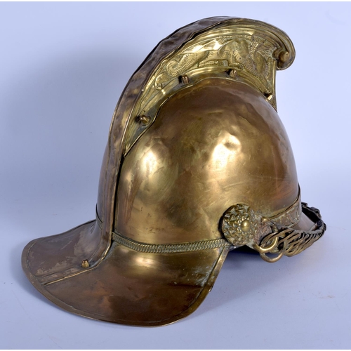 321 - A 1940S NSWFB BRASS FIREMAN'S HELMET. 26 cm x 28 cm.