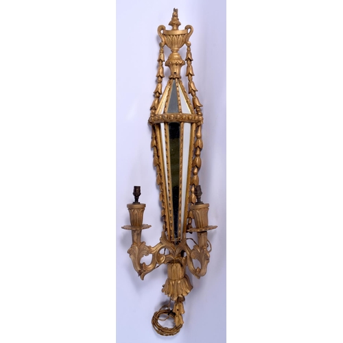 323 - AN ANTIQUE GILT WOOD MIRRORED LIGHT FITTING with urn finial and vine capped sconces. 90 cm x 22 cm.