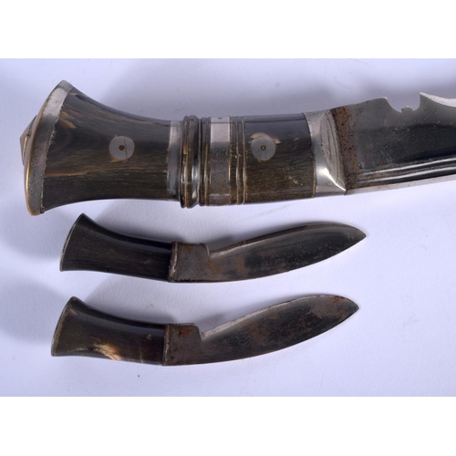 337 - TWO EARLY 20TH CENTURY CARVED RHINOCEROS HORN HANDLED KUKRI GURKHA KNIVES. 40 cm long. (2)