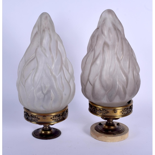 344 - A PAIR OF EARLY 20TH CENTURY FRENCH GILT BRASS AND FLAMING GLASS PENDANT LAMPS. 30 cm x 15 cm.