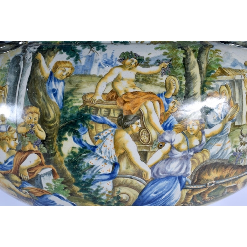 348 - A VERY LARGE 19TH CENTURY ITALIAN TWIN HANDLED MAJOLICA VASE painted with figures within landscapes.... 