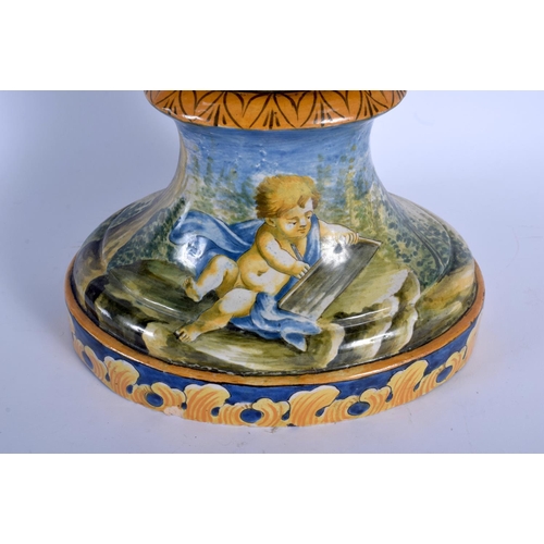 348 - A VERY LARGE 19TH CENTURY ITALIAN TWIN HANDLED MAJOLICA VASE painted with figures within landscapes.... 