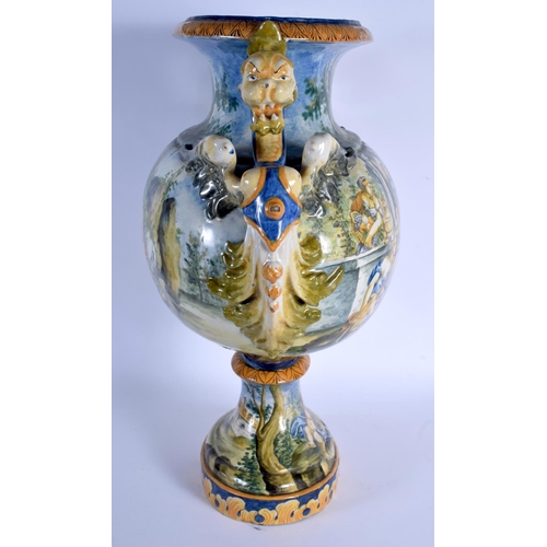 348 - A VERY LARGE 19TH CENTURY ITALIAN TWIN HANDLED MAJOLICA VASE painted with figures within landscapes.... 