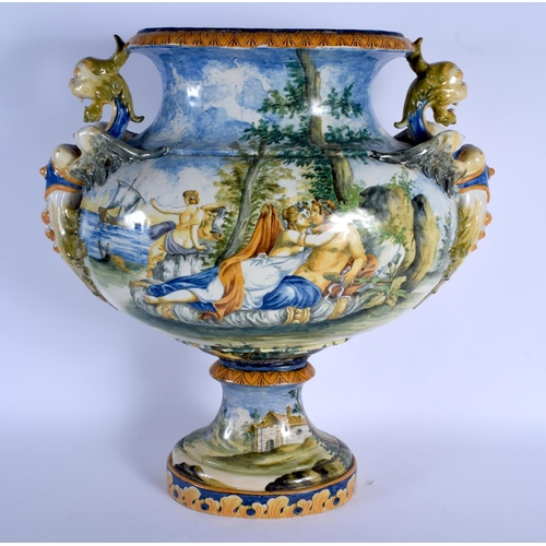 348 - A VERY LARGE 19TH CENTURY ITALIAN TWIN HANDLED MAJOLICA VASE painted with figures within landscapes.... 