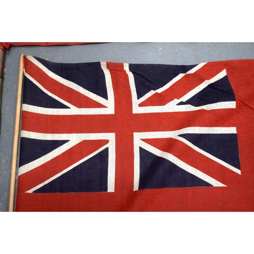 356 - TWO VINTAGE MILITARY FLAGS. Pole 104 cm long. (2)