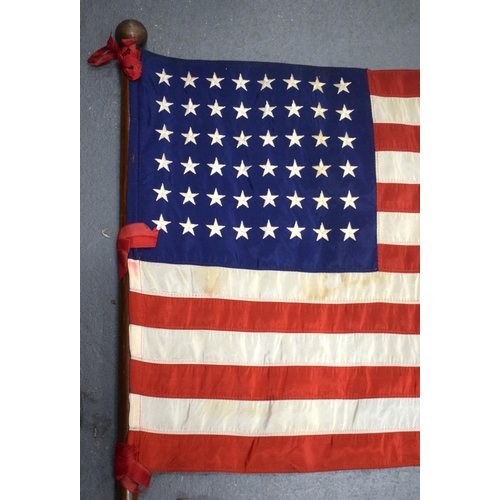 356 - TWO VINTAGE MILITARY FLAGS. Pole 104 cm long. (2)